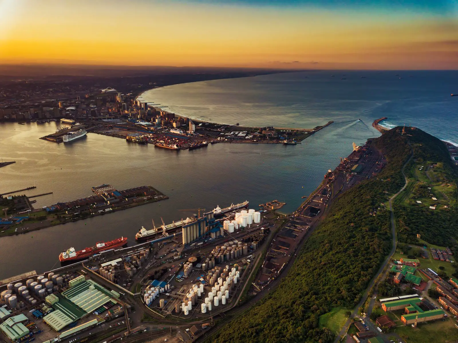 Aerial view of Durban harbour at sunset, where FW Clearing handles sea freight clearing and forwarding